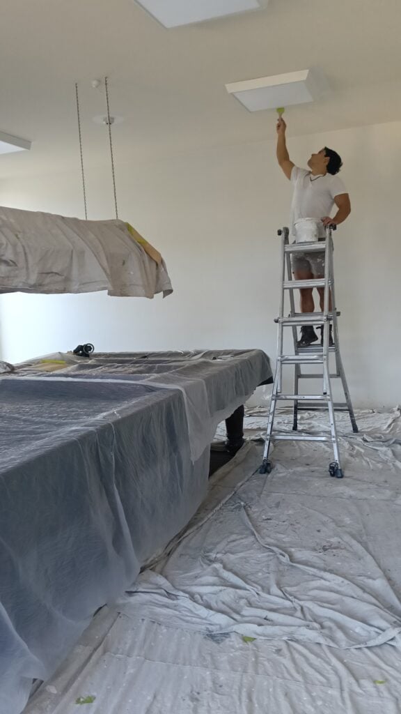 Interior painting underway at a clubhouse in Clear Island Waters
